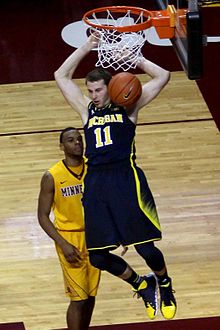 Stauskas (#11) while with Michigan in 2014 20140102 Nik Stauskas dunk (3).JPG