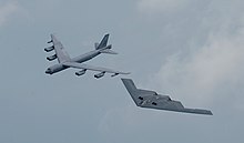 A B-52 Stratofortress of the 2nd Bomb Wing and a B-2A Spirit of the 509th Bomb Wing flying in formation B-52 and B-2.jpg