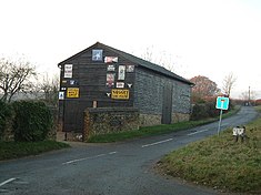 Barn with old signs, Buckland Common - geograph.org.uk - 90207.jpg