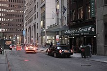 Western section of Stone Street (originally Breuers Straet), looking toward Broad Street Murphy's Tavern and the DoubleTree (29462702485).jpg