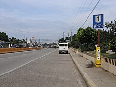 National Road, MCLL Highway-Divisoria sign