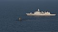 HNLMS Evertsen (F805), right, and the attack submarine HNLMS Dolfijn (S808) conduct maritime operations in the Baltic Sea during BALTOPS 2013