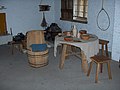 Restored table, barrel chair and stools