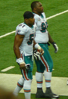 Former Cowboys teammates Ferguson (right) and Akin Ayodele in Miami in 2009. Akin Ayodele Jason Ferguson.jpg