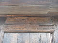 Pisania de deasupra uşii bisericii de lemn