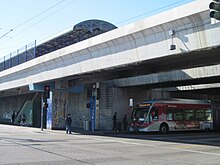 A view of the elevated Firestone station from street level.