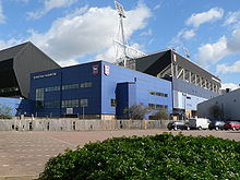 The Sir Alf Ramsey Stand of Portman Road, including one of the ground's floodlights