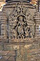 Pillar pedestal relief in the open hall in Kalleshvara temple at Bagali