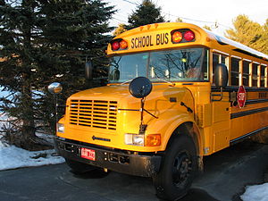 Front of a yellow school bus.