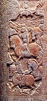 Dolgolas turški konjenik iz grobnice sogdijskega trgovca (okoli 570), Severne dinastije, Kitajska[42][26]