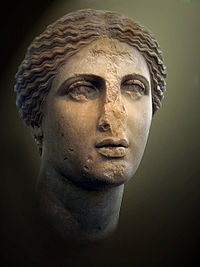 Head of Aphrodite, 1st century AD copy of an original by Praxiteles. The Christian cross on the chin and forehead was intended to "deconsecrate" a holy pagan artifact. Found in the Agora of Athens. National Archaeological Museum in Athens. Athena9.jpg