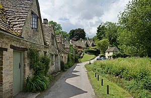 A row of cottages in Bibury, Cottswolds, England.