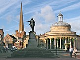 Bridgwater's Corn Exchange of 1834, 13th-century Church of St Mary with its 170 feet (52 m) slender spire and statue of Robert Blake.
