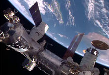 Dragon and Cygnus cargo vessels were docked at the ISS together for the first time in April 2016 Dragon and Cygnus docked on ISS.jpg