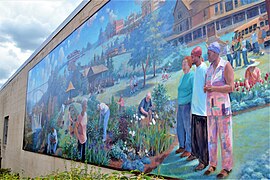 In the Garden, a mural painted on the side of Edgerton's post office, Dewey Station.