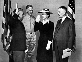 Oveta Culp Hobby being sworn in as the first WAAC by Major General Myron C. Cramer. General George C. Marshall, second from left, and Secretary of War Henry L. Stimson witness the ceremony. May 16, 1942.