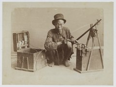 Chinese locksmith in Singapore, circa 1900. Lambert & Co., G.R.