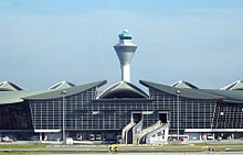 Kuala Lumpur International Airport is the 13th busiest airport in the world by international passenger traffic. KLIA MTB&Tower.jpg