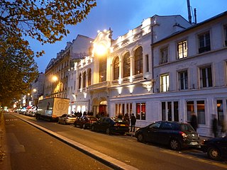 Restored facade at night in 2010