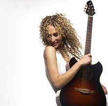 Summer XO with one of her Wechter Pathmaker guitars