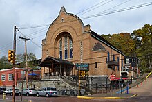 Mr. Smalls Theatre, a converted church building made of brick with a peaked roof. It is located on a corner in an low-urban environment.