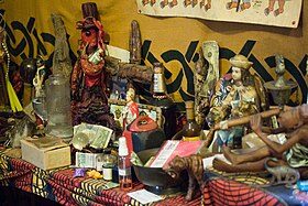 Example of Louisiana Voodoo altar inside a temple in New Orleans. Voodoo Altar New Orleans.jpg