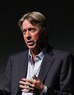 A picture of Alan Silvestri speaking towards the camera