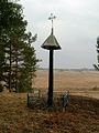 A roofed pole near Alkas, Kretinga district, Lithuania.