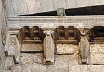 Detail of the stone brackets of the overhang above the gate