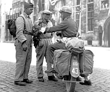 Members of the Belgian resistance with a Canadian soldier during the liberation of Bruges, 1944. Belgian res.jpg