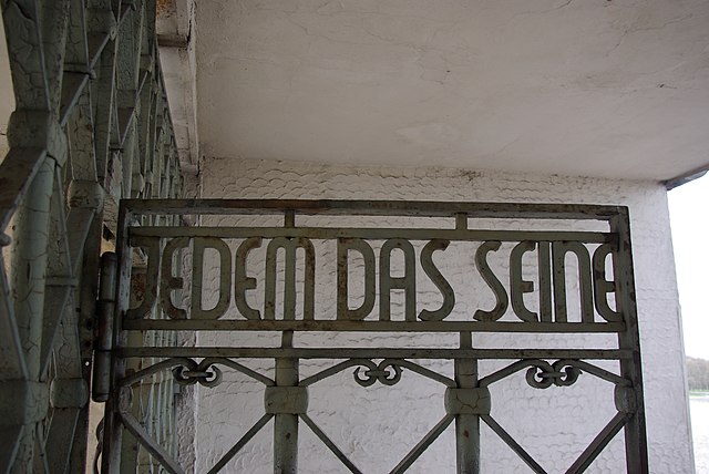 http://upload.wikimedia.org/wikipedia/commons/thumb/2/25/Buchenwald_Schild_Jedem_das_Seine.jpg/640px-Buchenwald_Schild_Jedem_das_Seine.jpg