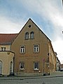 Wohnhaus in Ecklage, baulich verbunden mit Burgstraße 10a