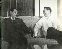 President-elect Ferdinand E. Marcos is received by incumbent President Diosdado Macapagal at the Malacanan Palace Music Room, before both proceeded to the inaugural venue, December 30, 1965. Ferdinand E. Marcos and Diosdado Macapagal at the Malacanan Palace Music Room.jpg