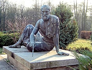 This bronze statue of Archimedes is at the Arc...