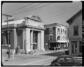 Industrial National Bank (redlink), it was demolished. Photo used in former NRHP-listings of Newport County. HABS document here covers it briefly, page 8 of PDF, HABS RI-337 Thames Street area study, labelled page 7. There is an interior photo of the bank available, too. Not much for an article on it, so far. :( It was originally "Newport Trust Company", located at 303 Thames Street, at Commercial Wharf, in Newport. --~~~~ Postcard image of it available here. There was "trouble" about the new building on Thames Street, in NYT coverage in 1902.