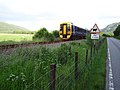 Trein op de Kyle of Lochalsh Line in de buurt van Garve