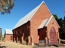 Colour photograph of the front and main entrance of St Stephen's, taken from the north-west