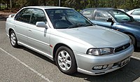 1996-1999 Subaru Liberty RX sedan with side turn signal repeater installed behind front wheel