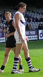 Aaron Sandilands towers over Carlton's Lance Whitnall at the Telstra Dome in 2006