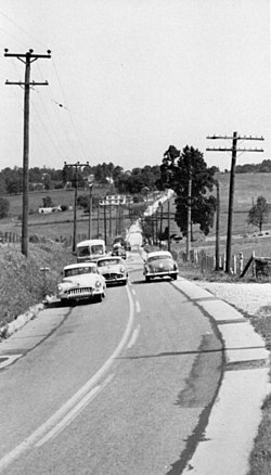 This rural road was widened but is still too narrow for 1953 traffic.