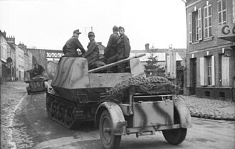 Marder I towing its ammunition trailer