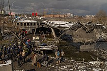 Civilians fleeing over the Irpin River bridge, March 2022 Civilian evacuation across Irpin River 2022-03-08 5.jpg