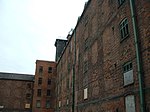 Former Ditherington Flax Mill and attached former Malting Kiln DitheringtonFlaxmillReverse.jpg