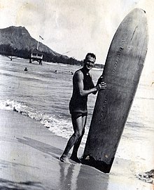 Dr. Cyril Pemberton surfing Waikiki Beach in 1916.jpg