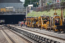 A number of maintenance vehicles at work on Metro-North Railroad Metro-North Bronx track work continues (9515218549).jpg