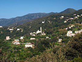 The church and surrounding buildings in Pino