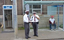 Toronto Transit Commission staff wearing peaked caps TTC Inspectors at Connaught.JPG