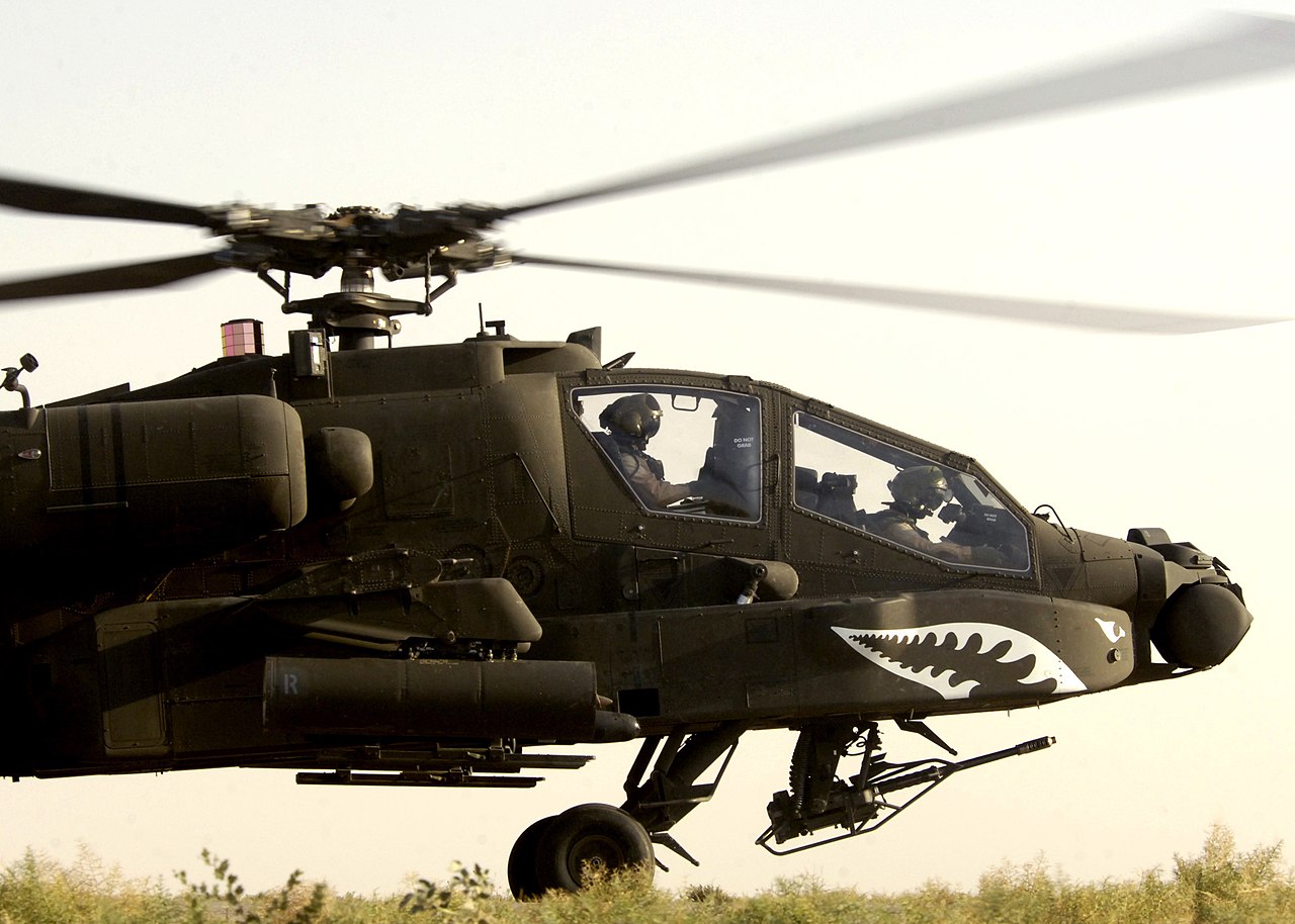 1280px-US_Navy_050803-N-5027S-174_A_U.S._Army_AH-64_Apache_helicopter_prepares_to_takeoff_for_a_mission_in_Iraq.jpg