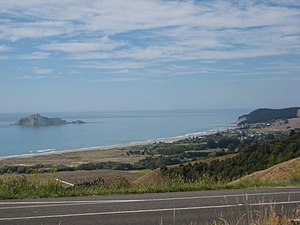 Waimarama from the hills above, with Bare Island to the left