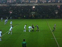 St Helens getting ready to play the ball during their clash with Widnes in the 2010 Karalius Cup.